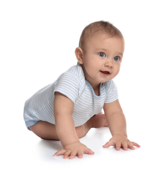 istock Cute little baby boy crawling on white background 1421199593