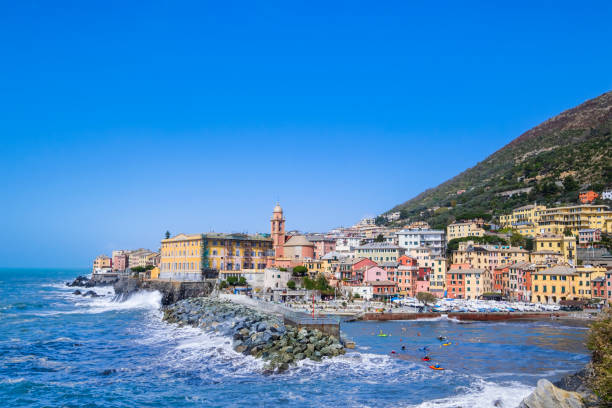 istock Small harbor in Nervi, Genoa, bordered by colorful buildings 1421199633