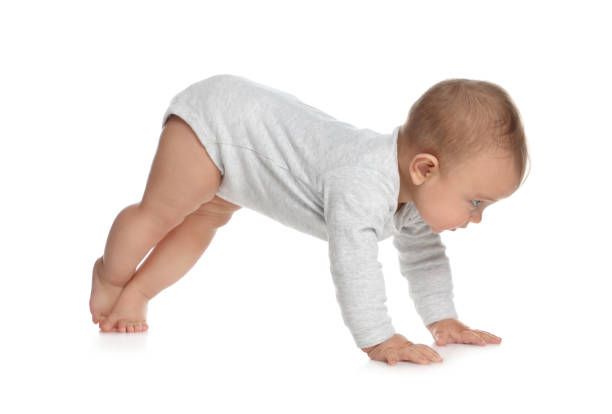 istock Cute little baby crawling on white background 1421199634