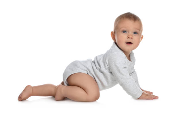 istock Cute little baby crawling on white background 1421199660