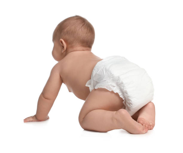 istock Cute little baby in diaper crawling on white background 1421199690