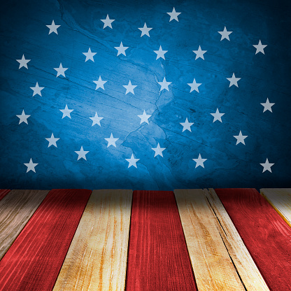 istock 4th of July - USA Independence Day. Empty room decorated in style of American flag, space for design 1421201307