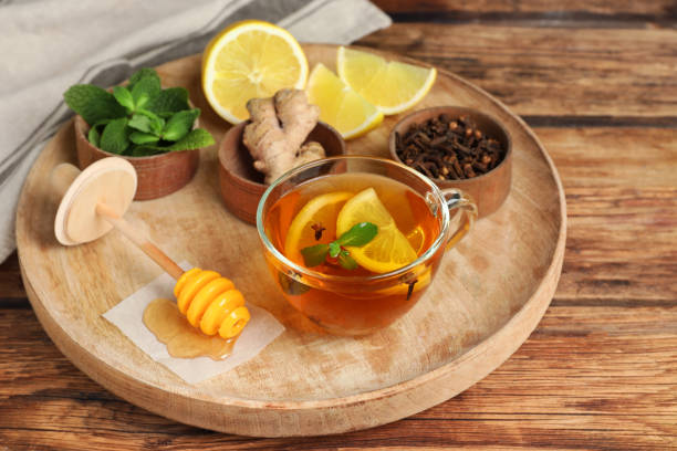 istock Immunity boosting drink and ingredients on wooden table 1421201994
