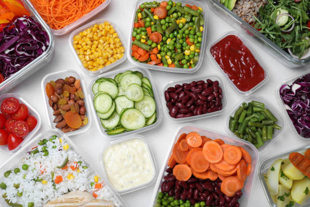 istock Set of containers with fresh food on white table, flat lay 1421202683
