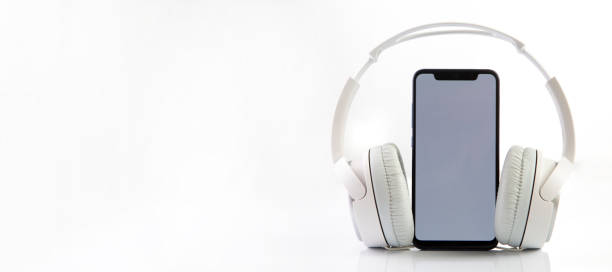 istock White headphones on smartphone music online concept, mockup, isolate on white 1421207317