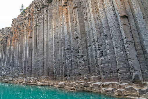 Full frame of basalt columns in Studlagil canyon, Jokuldalur Valley.