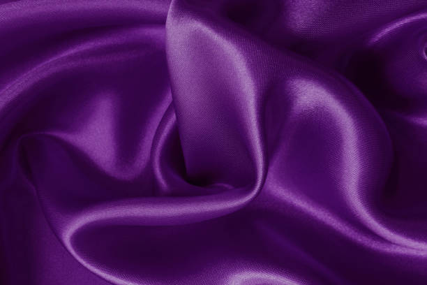 istock Purple fabric cloth texture for background and design art work, beautiful crumpled pattern of silk or linen. 1421210632