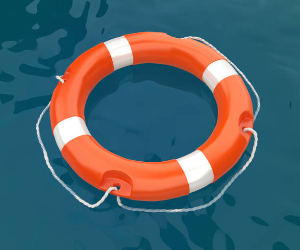 istock Lifebuoy ring floating on sea 1421211504