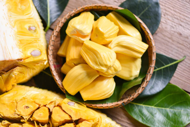 istock jackfruit on wooden basket with leaf, ripe jackfruit peeled tropical fruit fresh from jackfruit tree - top view 1421213370