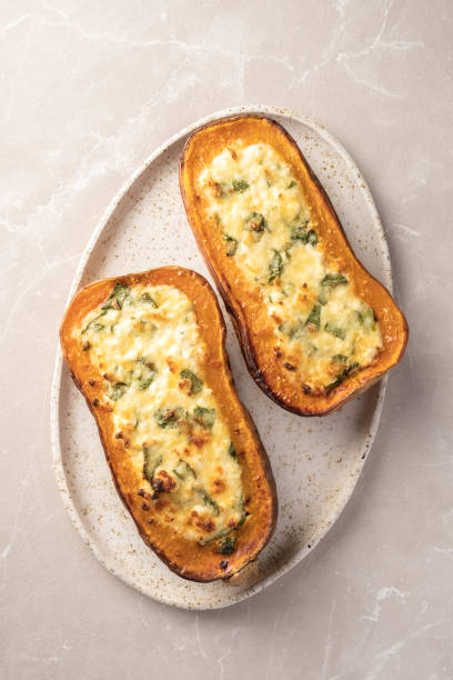 istock Baked Butternut Squash Stuffed with Spinach and cheese 1421216165