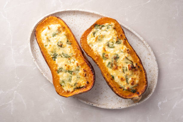istock Baked Butternut Squash Stuffed with Spinach and cheese 1421216166