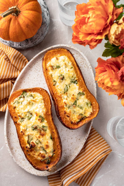 istock Baked Butternut Squash Stuffed with Spinach and cheese 1421216175