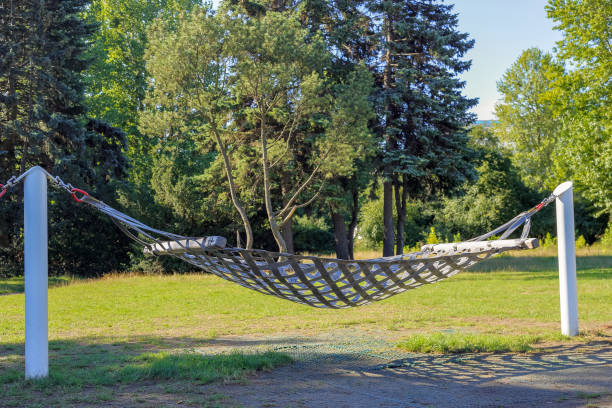 istock A hammock stretched over two white posts in a city park 1421216645