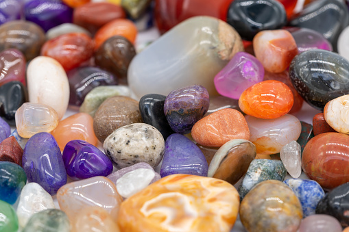many healing gem stones background texture