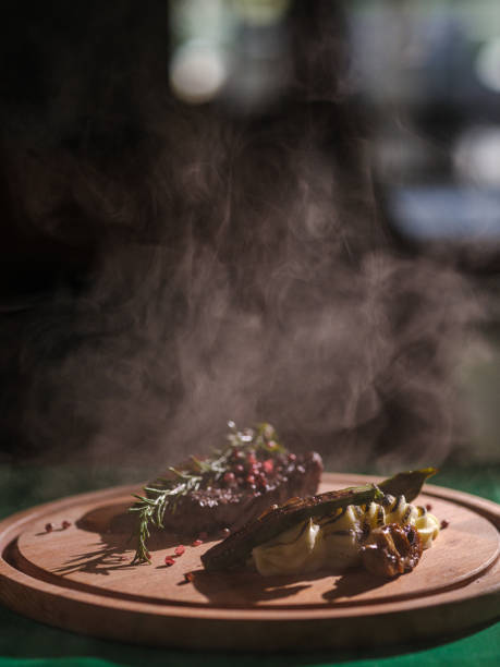 istock a fresh steak and vegetables on the plate 1421222815