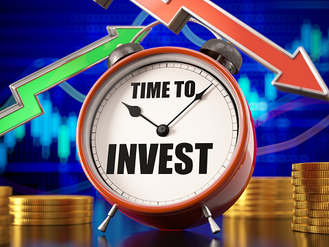 Time to Invest Concept with an Alarm Clock Financial Graph Trade Arrows and Coins. 3D Render