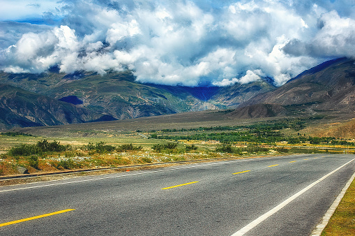 Paved mountain road from Lhasa  to Shigatse through the high central Tibetan plateau, Tibet.