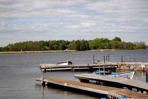 istock Docks with parked boats on the lakeshore 1421229219