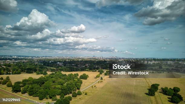 Beautiful View Of The London Skyline Seen From Richmond Park Against A Cloudy Sky Stock Photo - Download Image Now