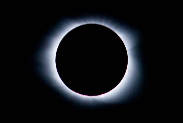 istock Breathtaking view of solar eclipse in the dark sky 1421231098