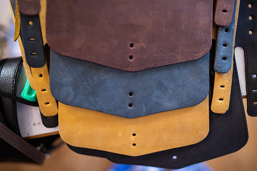 Unfinished leather bags in a leather workshop