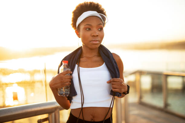 istock Beautiful African woman resting after training. 1421234262