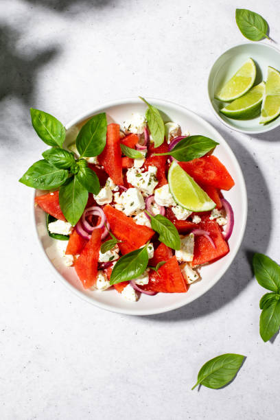 istock Summer watermelon salad top view 1421234951