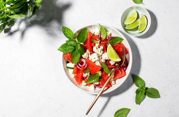 istock Summer watermelon salad top view 1421234972