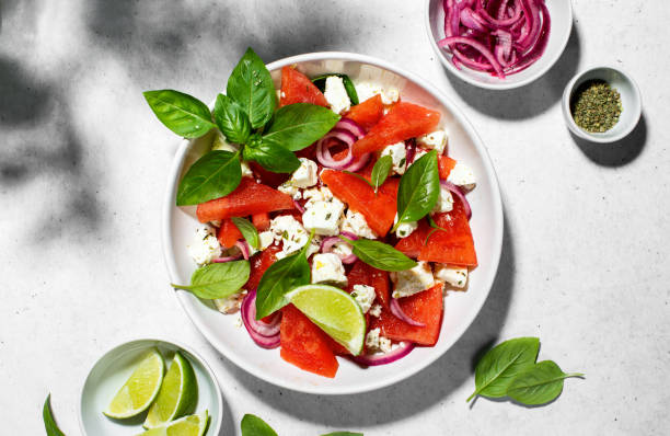 istock Summer watermelon salad top view 1421234996