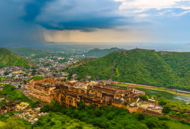 Amber or Amer Fort. Arial View of Amber or Amer Fort  with Cityscape and Aravalli Range  from Jaigarh Fort at Jaipur, Rajasthan. jaipur stock pictures, royalty-free photos & images