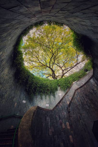 istock Spiral staircase at Fort Canning Park, Singapore 1421237340