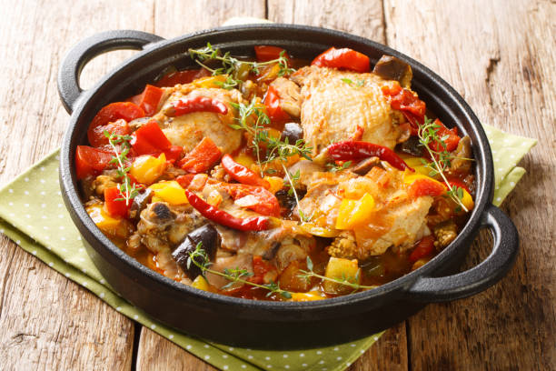 istock Kedjenou Chicken and Vegetable Stew Without Using Water closeup in the pan. Horizontal 1421240604