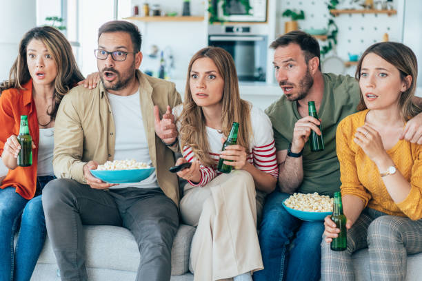 istock Friends watching tv 1421240689