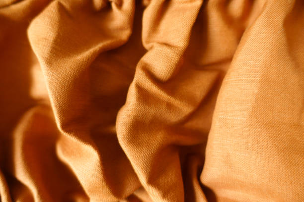 istock Jammed brownish orange hemp and cotton fabric 1421241026