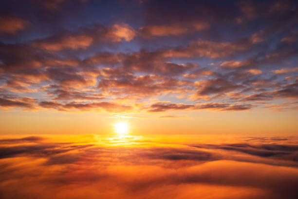 istock Beautiful landscape above the clouds of setting sun 1421241227