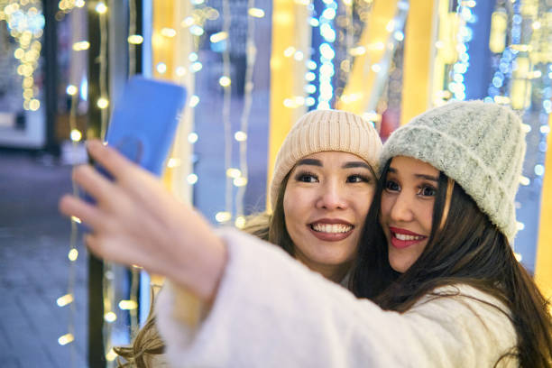 istock New Year's mood, two girlfriends 1421241499