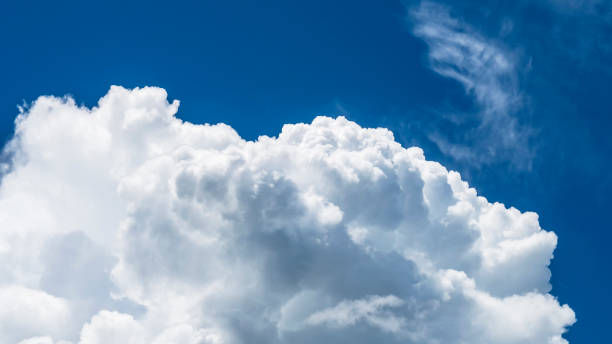 istock Blue sky fluffy white clouds on summer season bright clear skyline with beautiful cloudscape. Panorama blue sky clouds pattern on daylight with copy space. Cumulus cloudscape air climate sunny day 1421242870