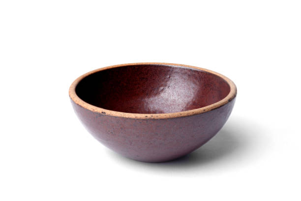 istock ceramic bowl on a white backgroundClean empty ceramic bowl isolated on white 1421245565