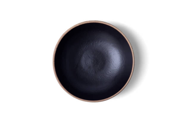 istock ceramic bowl on a white backgroundClean empty ceramic bowl isolated on white 1421245584