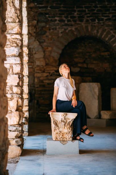 istock Young Woman Exploring the Ancient City 1421246711