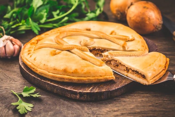 istock Spanish empanada - traditional meat pie with onions, Spanish cuisine 1421247201