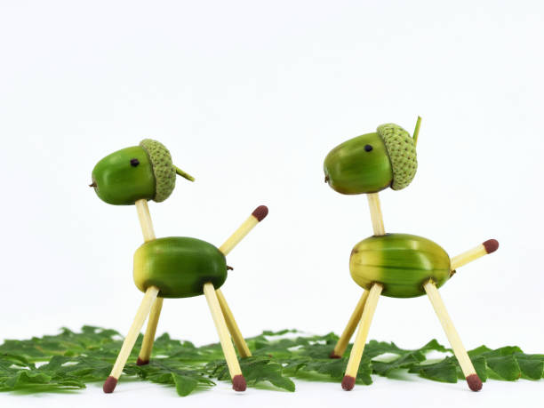 istock Cute animal figurines made of acorns 1421248310