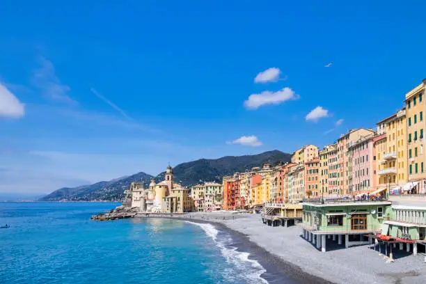 Colorful buildings lined up on the Camogli promenade