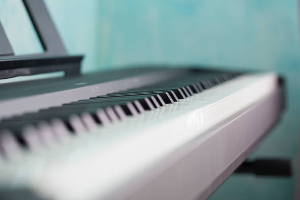 istock Selective focus. Piano and keyboard piano 1421260473