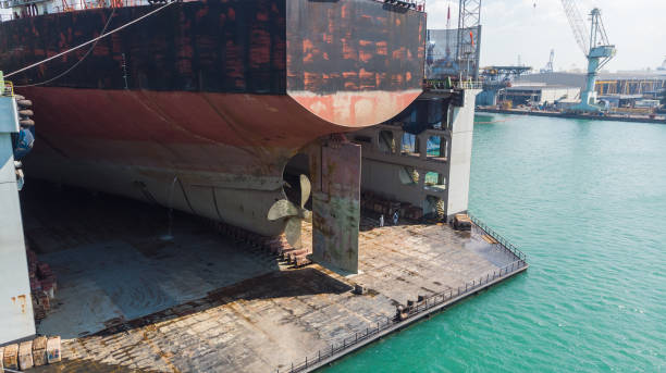 istock ship stern with propeller at drydock for maintenance follow anual plan and service 1421265171