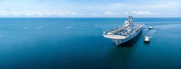 Nuclear ship, Military navy ship carrier full loading fighter jet aircraft and helicopter patrol.
