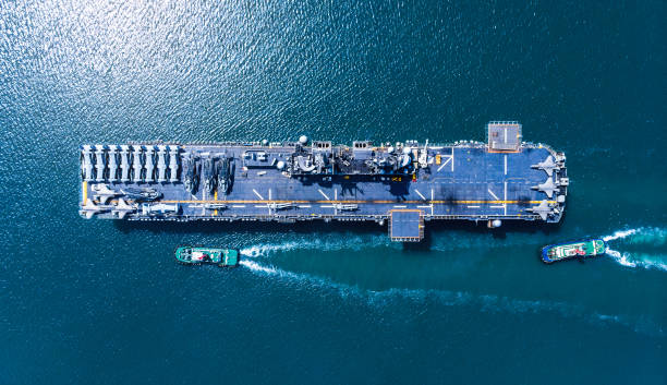 istock Nuclear ship, Military navy ship carrier full loading fighter jet aircraft and helicopter patrol. 1421265919