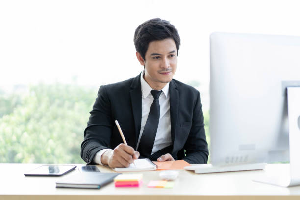 istock Asian businessman in office. 1421266297