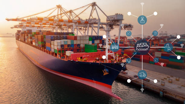istock Smart crane loading cargo container to container ship in the international terminal depot yard port  concept freight shipping by ship at sunrise with transportation icons. 1421266904