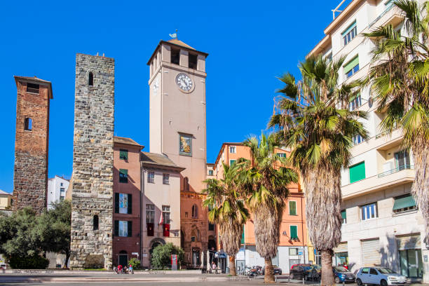 Piazza del Brandale in Savona with the three towers - Liguria, Italy The Torre del Brandale is located in the homonymous square, together with the medieval towers Corsi and Riario, dominating the skyline of the square province of savona stock pictures, royalty-free photos & images